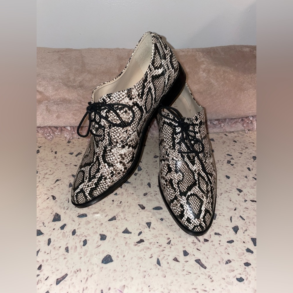 Women’s Cole Haan laced snake skin shoe